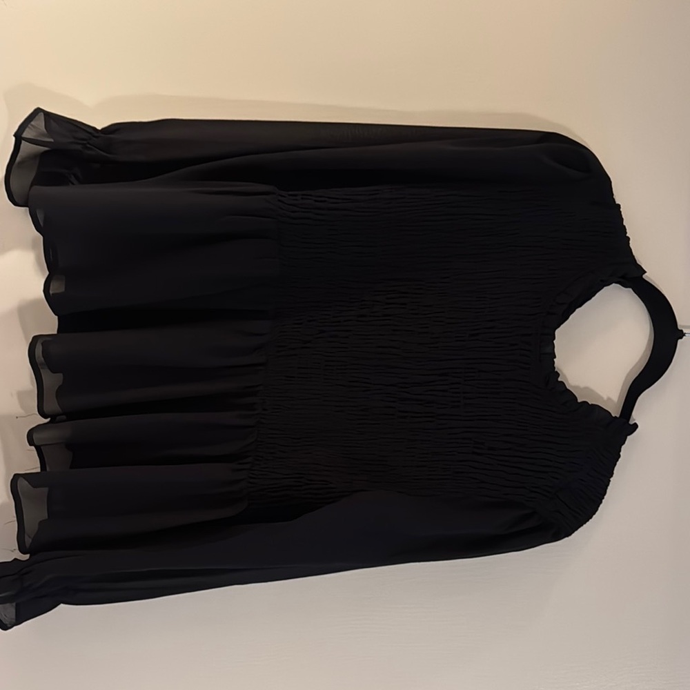 Elegant Black peplum style Blouse